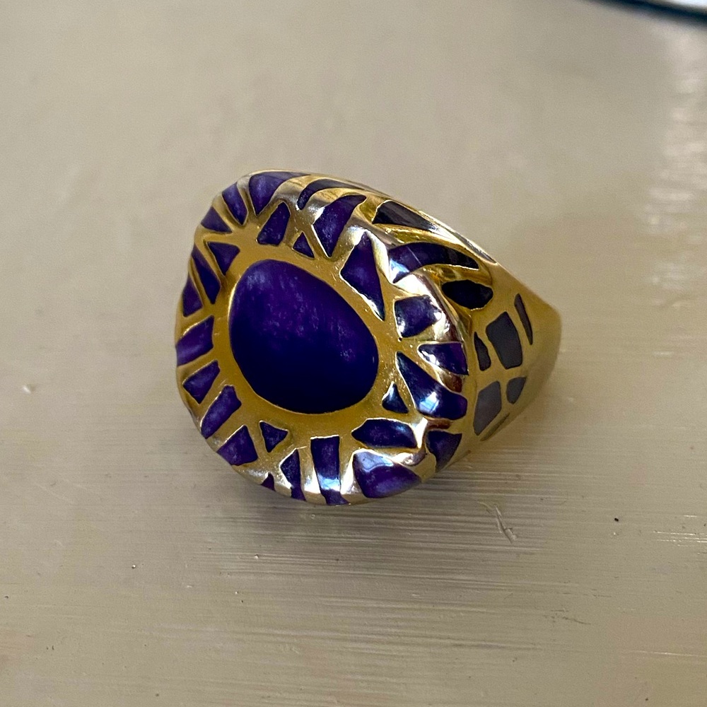 Beautiful Amethyst colored ring with gold accents